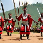 **Rwandan Intore dancers in traditional attire performing a royal dance with swords and spears.**